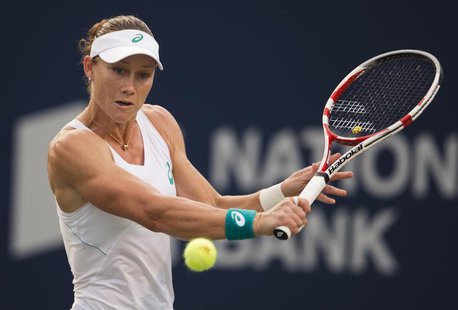 Samantha Stosur of Australia hits a return to Petra Kvitova of the Czech Republic during their women's tennis match at the Rogers Cup tennis Samantha Stosur of Australia hits a return to Petra Kvitova of the Czech Republic during their women's tennis match at the Rogers Cup tennis