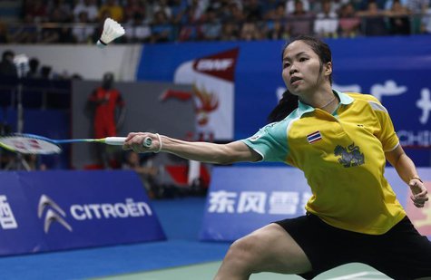 Thailand's Ratchanok Intanon hits a return to China's Li Xuerui during their women's singles final match at the 2013 Badminton World Champio Thailand's Ratchanok Intanon hits a return to China's Li Xuerui during their women's singles final match at the 2013 Badminton World Champio