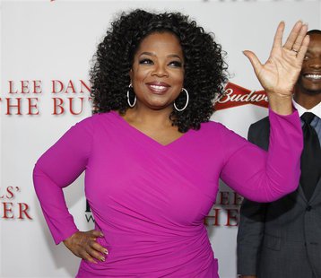 Actress Oprah Winfrey, a cast member of the film "Lee Daniels' The Butler", poses at the film's premiere in Los Angeles August 12, 2013. REU Actress Oprah Winfrey, a cast member of the film "Lee Daniels' The Butler", poses at the film's premiere in Los Angeles August 12, 2013. REU