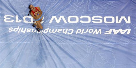 Yelena Isinbayeva of Russia reacts as she competes in the women's pole vault final during the IAAF World Athletics Championships at the Luzh Yelena Isinbayeva of Russia reacts as she competes in the women's pole vault final during the IAAF World Athletics Championships at the Luzh