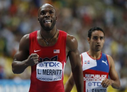LaShawn Merritt (L) of the U.S. reacts next to third placed Luguelin Santos of Dominican Republic after winning the men's 400 metres final o LaShawn Merritt (L) of the U.S. reacts next to third placed Luguelin Santos of Dominican Republic after winning the men's 400 metres final o