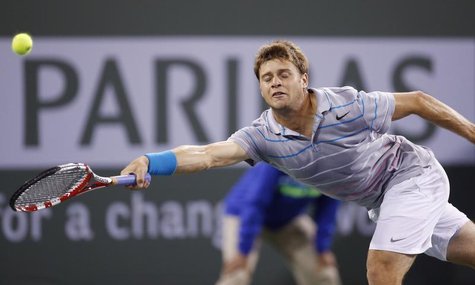 Ryan Harrison of the U.S. misses a shot against Rafael Nadal of Spain during their match at the BNP Paribas Open ATP tennis tournament in In Ryan Harrison of the U.S. misses a shot against Rafael Nadal of Spain during their match at the BNP Paribas Open ATP tennis tournament in In