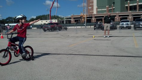 Bike safety taught to kids by local law enforcement during Bike Safety Rodeo at Lambeau Field on August 13, 2013. (Photo by: Jeff Flynt). Bike safety taught to kids by local law enforcement during Bike Safety Rodeo at Lambeau Field on August 13, 2013. (Photo by: Jeff Flynt).