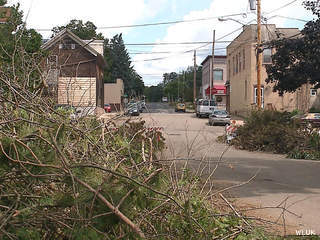 Brush from storms six days earlier lines streets in Hortonville, Aug. 13, 2013. (Photo courtesy of Fox 11 WLUK-TV) Brush from storms six days earlier lines streets in Hortonville, Aug. 13, 2013. (Photo courtesy of Fox 11 WLUK-TV)