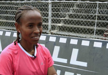 Ethiopia's Meseret Defar, the women's 5000 meters gold medallist at the London 2012 Olympic Games, rests during a training session in Addis Ethiopia's Meseret Defar, the women's 5000 meters gold medallist at the London 2012 Olympic Games, rests during a training session in Addis