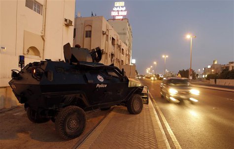 An armoured personnel carrier is seen by the side of a road during the early hours of the evening in Manama August 13, 2013. REUTERS/Hamad I An armoured personnel carrier is seen by the side of a road during the early hours of the evening in Manama August 13, 2013. REUTERS/Hamad I
