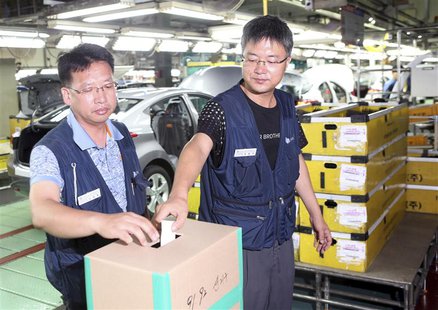 Workers of Hyundai Motor labour union cast their votes to decide on a strike at their plant in Ulsan, about 410 km (255 miles) southeast of Workers of Hyundai Motor labour union cast their votes to decide on a strike at their plant in Ulsan, about 410 km (255 miles) southeast of