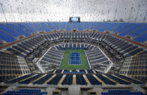 A general view of the Arthur Ashe Stadium during a downpour at the U.S. Open tennis tournament in New York September 8, 2012. REUTERS/Kevin A general view of the Arthur Ashe Stadium during a downpour at the U.S. Open tennis tournament in New York September 8, 2012. REUTERS/Kevin