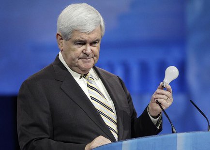 Former U.S. House Speaker Newt Gingrich (R-GA) holds up a light bulb in remarks about the Republican Party's need to innovate, to the Conser Former U.S. House Speaker Newt Gingrich (R-GA) holds up a light bulb in remarks about the Republican Party's need to innovate, to the Conser
