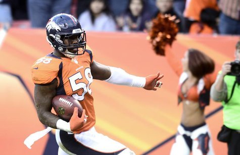 Denver Broncos' Von Miller trots into the inzone after intercepting a pass from Tampa Bay Buccaneers Josh Freeman during their NFL football Denver Broncos' Von Miller trots into the inzone after intercepting a pass from Tampa Bay Buccaneers Josh Freeman during their NFL football