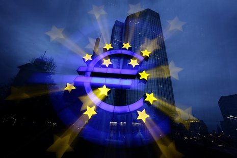 A zoom-burst image shows the illuminated euro sign in front of the headquarters of the European Central Bank (ECB) in Frankfurt April 5, 201 A zoom-burst image shows the illuminated euro sign in front of the headquarters of the European Central Bank (ECB) in Frankfurt April 5, 201
