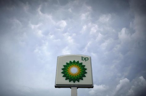 Storm clouds form near a BP station in Alexandria, Virginia July 19, 2010. REUTERS/Molly Riley Storm clouds form near a BP station in Alexandria, Virginia July 19, 2010. REUTERS/Molly Riley