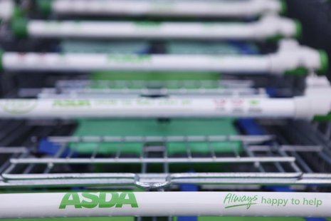 Trolleys are lined up outside an ASDA supermarket in London January 23, 2012. REUTERS/Finbarr O'Reilly Trolleys are lined up outside an ASDA supermarket in London January 23, 2012. REUTERS/Finbarr O'Reilly