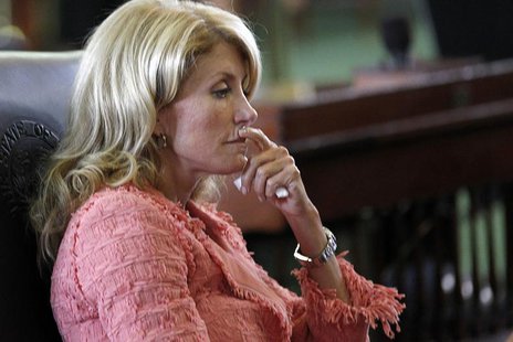 Texas state Democratic Senator Wendy Davis listens as the state Senate meets to consider legislation restricting abortion rights in Austin, Texas state Democratic Senator Wendy Davis listens as the state Senate meets to consider legislation restricting abortion rights in Austin,