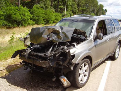 SUV that rear-ended a log truck 8/13/13. Photo: Portage County Sheriff's Department
SUV that rear-ended a log truck 8/13/13. Photo: Portage County Sheriff's Department