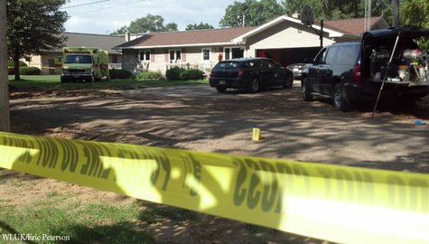 Authorities investigate a home on S. Water St. in Wautoma Aug. 15, 2013, one day after a robbery suspect broke into the home and held officers at bay. (Photo by: FOX 11). Authorities investigate a home on S. Water St. in Wautoma Aug. 15, 2013, one day after a robbery suspect broke into the home and held officers at bay. (Photo by: FOX 11).