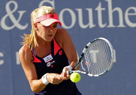 Agnieszka Radwanska of Poland hits a return to Varvara Lepchenko of the U.S. during their women's singles tennis match at the Cincinnati Ope Agnieszka Radwanska of Poland hits a return to Varvara Lepchenko of the U.S. during their women's singles tennis match at the Cincinnati Ope