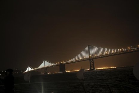 A lighted art display is shown on the San Francisco-Oakland Bay Bridge in San Francisco, California March 5, 2013. REUTERS/Robert Galbraith A lighted art display is shown on the San Francisco-Oakland Bay Bridge in San Francisco, California March 5, 2013. REUTERS/Robert Galbraith