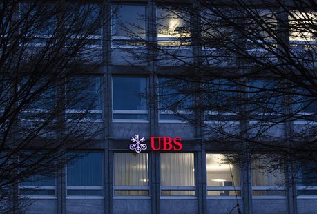 An illuminated logo of Swiss bank UBS is pictured on an office building in Lucerne February 16, 2012. REUTERS/Michael Buholzer An illuminated logo of Swiss bank UBS is pictured on an office building in Lucerne February 16, 2012. REUTERS/Michael Buholzer
