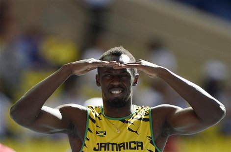 Usain Bolt of Jamaica looks on before his men's 200 metrers heats during the IAAF World Athletics Championships at the Luzhniki stadium in M Usain Bolt of Jamaica looks on before his men's 200 metrers heats during the IAAF World Athletics Championships at the Luzhniki stadium in M