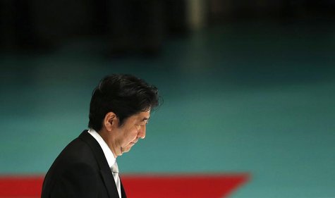 Japan's Prime Minister Shinzo Abe attends a memorial service ceremony marking the 68th anniversary of Japan's defeat in World War Two, at Bu Japan's Prime Minister Shinzo Abe attends a memorial service ceremony marking the 68th anniversary of Japan's defeat in World War Two, at Bu