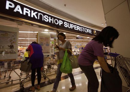 Shoppers are seen outside one of the biggest Parknshop Superstores, owned by tycoon Li Ka-shing, inside a shopping mall in Hong Kong July 25 Shoppers are seen outside one of the biggest Parknshop Superstores, owned by tycoon Li Ka-shing, inside a shopping mall in Hong Kong July 25