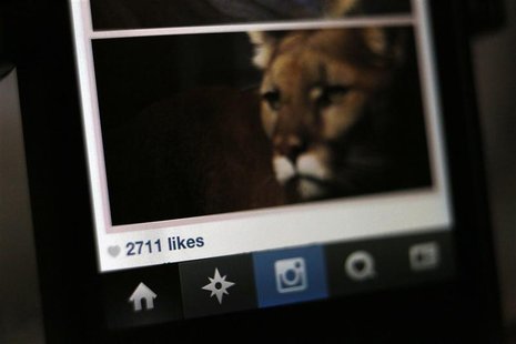 The number of likes on an Instagram photo are pictured on a mobile device screen in Pasadena, California August 14, 2013. Researchers with R The number of likes on an Instagram photo are pictured on a mobile device screen in Pasadena, California August 14, 2013. Researchers with R