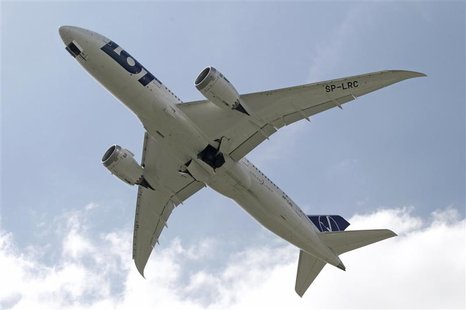 Boeing 787 Dreamliner belonging to Polish airline LOT flies after taking off from the Chopin International Airport in Warsaw June 1, 2013. R Boeing 787 Dreamliner belonging to Polish airline LOT flies after taking off from the Chopin International Airport in Warsaw June 1, 2013. R