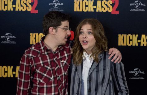 Actors Christopher Mintz-Plasse and Chloe Grace Moretz (R) pose during a media event for the film "Kick Ass 2", in London August 5, 2013. RE Actors Christopher Mintz-Plasse and Chloe Grace Moretz (R) pose during a media event for the film "Kick Ass 2", in London August 5, 2013. RE
