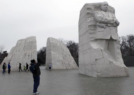A tourist takes a picture of the Martin Luther King, Jr. Memorial in Washington February 22, 2013. REUTERS/Gary Cameron A tourist takes a picture of the Martin Luther King, Jr. Memorial in Washington February 22, 2013. REUTERS/Gary Cameron