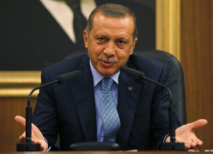 Turkey's Prime Minister Tayyip Erdogan gestures as he addresses the media before leaving for Turkmenistan at Esenboga Airport in Ankara Augu Turkey's Prime Minister Tayyip Erdogan gestures as he addresses the media before leaving for Turkmenistan at Esenboga Airport in Ankara Augu