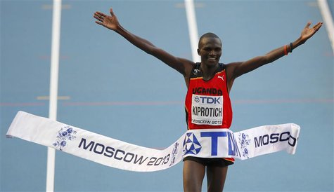 Stephen Kiprotich of Uganda celebrates winning the men's marathon during the IAAF World Athletics Championships at the Luzhniki stadium in M Stephen Kiprotich of Uganda celebrates winning the men's marathon during the IAAF World Athletics Championships at the Luzhniki stadium in M