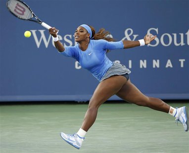 Serena Williams of the U.S. hits a return ball to Li Na of China in their semi-final round match at the Women's Cincinnati Open tennis tourn Serena Williams of the U.S. hits a return ball to Li Na of China in their semi-final round match at the Women's Cincinnati Open tennis tourn