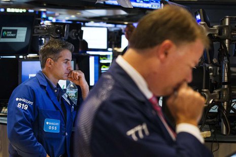 Traders work on the floor of the New York Stock Exchange shortly before the closing of the market in New York, August 15, 2013. REUTERS/Luca Traders work on the floor of the New York Stock Exchange shortly before the closing of the market in New York, August 15, 2013. REUTERS/Luca