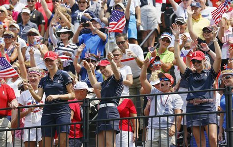 (Front L-R) Jessica Korda, Morgan Pressel and Paula Creamer of Team USA encourage fans on the first tee during the Friday afternoon four-bal (Front L-R) Jessica Korda, Morgan Pressel and Paula Creamer of Team USA encourage fans on the first tee during the Friday afternoon four-bal
