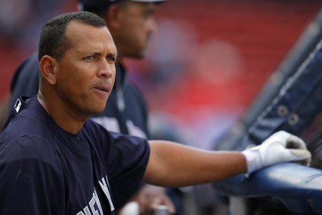 New York Yankees third baseman Alex Rodriguez warms up before the Yankees' American League baseball game against the Boston Red Sox at Fenwa New York Yankees third baseman Alex Rodriguez warms up before the Yankees' American League baseball game against the Boston Red Sox at Fenwa