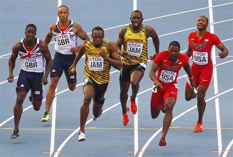 (L-R) Dwain Chambers of Britain takes the baton from teammate James Ellington, Usain Bolt of Jamaica takes the baton from teammate Nickel As (L-R) Dwain Chambers of Britain takes the baton from teammate James Ellington, Usain Bolt of Jamaica takes the baton from teammate Nickel As