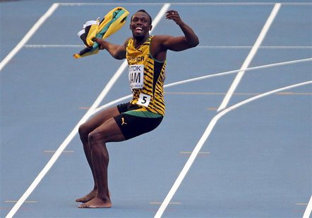 Usain Bolt reacts after Jamaica won the men's 4x100 metres relay final during the IAAF World Athletics Championships at the Luzhniki stadium Usain Bolt reacts after Jamaica won the men's 4x100 metres relay final during the IAAF World Athletics Championships at the Luzhniki stadium