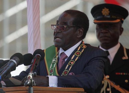 Zimbabwe's President Robert Mugabe addresses supporters during celebrations to mark the country's Defence Forces Day in the capital Harare, Zimbabwe's President Robert Mugabe addresses supporters during celebrations to mark the country's Defence Forces Day in the capital Harare,