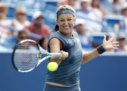 Victoria Azarenka of Belarus hits a return to Serena Williams of the U.S. during their championship match at the women's Cincinnati Open ten Victoria Azarenka of Belarus hits a return to Serena Williams of the U.S. during their championship match at the women's Cincinnati Open ten