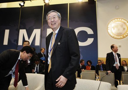 Governor of the People's Bank of China (PBOC) Zhou Xiaochuan (C) arrives at the International Monetary and Financial Committee (IMFC) meetin Governor of the People's Bank of China (PBOC) Zhou Xiaochuan (C) arrives at the International Monetary and Financial Committee (IMFC) meetin