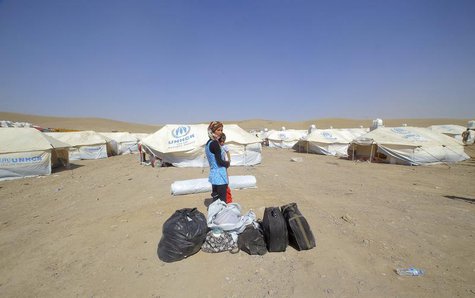 Syrian refugees who fled the violence in Syria, are seen at a new refugee camp in Arbil, about 350 km (220 miles) north of Baghdad August 16 Syrian refugees who fled the violence in Syria, are seen at a new refugee camp in Arbil, about 350 km (220 miles) north of Baghdad August 16