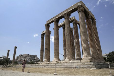 A woman visits the ancient Temple of Zeus in Athens July 2, 2013. REUTERS/John Kolesidis A woman visits the ancient Temple of Zeus in Athens July 2, 2013. REUTERS/John Kolesidis