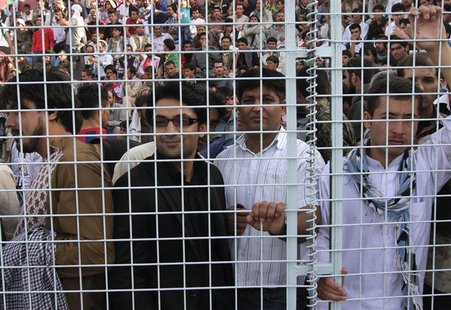 Afghan soccer fans watch a friendly match between Afghanistan and Pakistan in Kabul August 20, 2013. REUTERS/Omar Sobhani Afghan soccer fans watch a friendly match between Afghanistan and Pakistan in Kabul August 20, 2013. REUTERS/Omar Sobhani