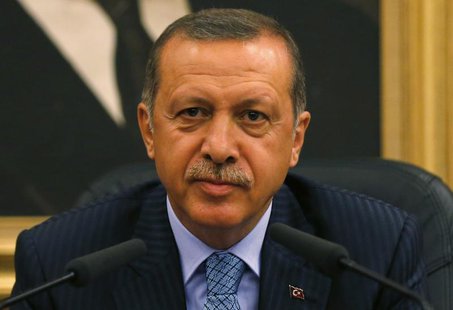 Turkey's Prime Minister Tayyip Erdogan addresses the media before he leaves for Turkmenistan at Esenboga Airport in Ankara August 15, 2013. Turkey's Prime Minister Tayyip Erdogan addresses the media before he leaves for Turkmenistan at Esenboga Airport in Ankara August 15, 2013.