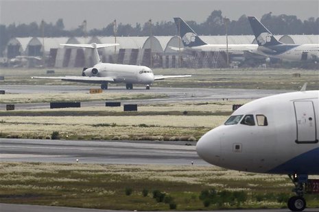 The airplane transporting Sandra Avila Beltran, also known as "The Queen of the Pacific", lands at the Benito Juarez International airport i The airplane transporting Sandra Avila Beltran, also known as "The Queen of the Pacific", lands at the Benito Juarez International airport i