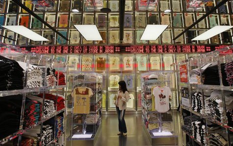 A shopper walks in Fast Retailing's Uniqlo casual clothing store in Tokyo July 11, 2013. REUTERS/Toru Hanai A shopper walks in Fast Retailing's Uniqlo casual clothing store in Tokyo July 11, 2013. REUTERS/Toru Hanai