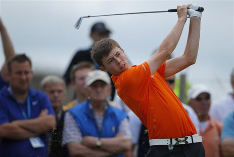 Amateur Matthew Fitzpatrick of England watches his tee shot on the second hole during a practice round ahead of the British Open golf champi Amateur Matthew Fitzpatrick of England watches his tee shot on the second hole during a practice round ahead of the British Open golf champi