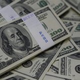 U.S. one-hundred dollar bills are seen in this photo illustration at a bank in Seoul August 2, 2013. REUTERS/Kim Hong-Ji U.S. one-hundred dollar bills are seen in this photo illustration at a bank in Seoul August 2, 2013. REUTERS/Kim Hong-Ji