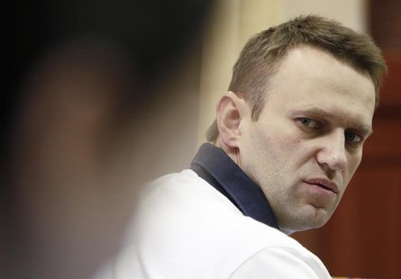 Russian opposition leader and anti-corruption blogger Alexei Navalny looks on during a break in a court hearing in Kirov July 2, 2013. REUTE Russian opposition leader and anti-corruption blogger Alexei Navalny looks on during a break in a court hearing in Kirov July 2, 2013. REUTE